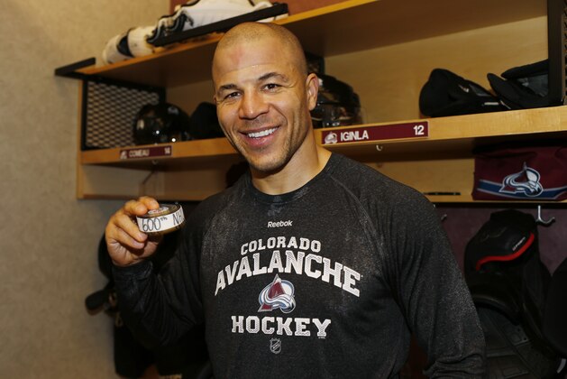Colorado Avalanche right wing Jarome Iginla holds up the puck in the locker room after he scored his 600th career goal in the third period of an NHL hockey game against the Los Angeles Kings Monday, Jan. 4, 2016, in Denver. Colorado won 4-1. (AP Photo/David Zalubowski) Colorado Avalanche right wing Jarome Iginla holds up the puck in the locker room after he scored his 600th career goal in the third period of an NHL hockey game against the Los Angeles Kings Monday, Jan. 4, 2016, in Denver. Colorado won 4-1. (AP Photo/David Zalubowski)