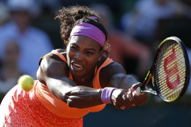 FILE - In this June 4, 2015, file photo, Serena Williams, of the United States, returns a shot in her semifinal match of the French Open tennis tournament against Timea Bacsinszky, of Switzerland, at the Roland Garros stadium in Paris. Williams withdrew from her opening match at the Hopman Cup on Monday, Jan. 4, 2016 because of inflammation in her left knee, an early setback in her preparations for an Australian Open title defense. (AP Photo/Francois Mori, File)