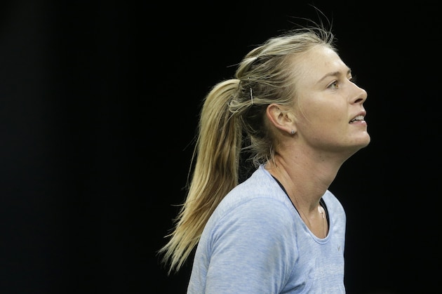Maria Sharapova from Russia concentrates during a training session prior to the Fed Cup Final tennis tournament against Czech Republic in Prague, Czech Republic, Wednesday, Nov. 11, 2015. (AP Photo/Petr David Josek)