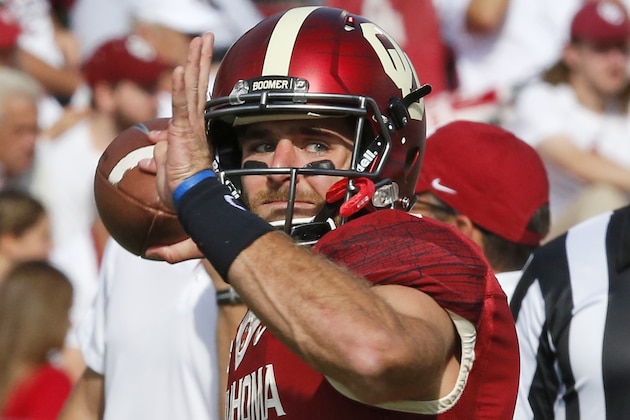 Oklahoma quarterback Trevor Knight throws before an NCAA college football game between West Virginia and Oklahoma in Norman, Okla., Saturday, Oct. 3, 2015. (AP Photo/Sue Ogrocki)