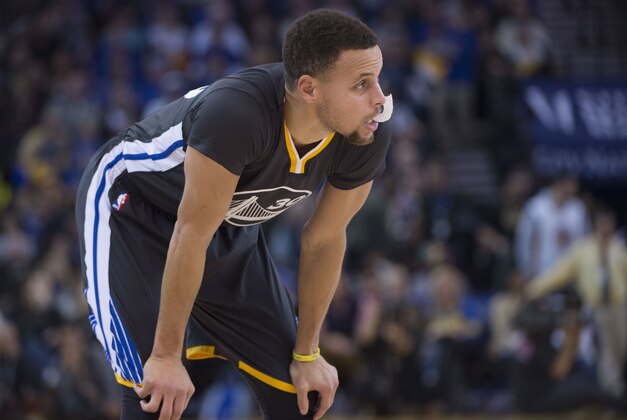 January 2, 2016; Oakland, CA, USA; Golden State Warriors guard Stephen Curry (30) reacts during the second quarter against the Denver Nuggets at Oracle Arena. The Warriors defeated the Nuggets 111-108 in overtime. Mandatory Credit: Kyle Terada-USA TODAY Sports