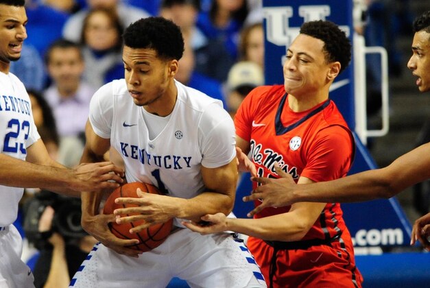 Jan 2, 2016; Lexington, KY, USA; Kentucky Wildcats forward Skal Labissiere (1) keeps the ball away from Mississippi Rebels guard Sam Finley (10) during the first half at Rupp Arena. Mandatory Credit: Joshua Lindsey-USA TODAY Sports