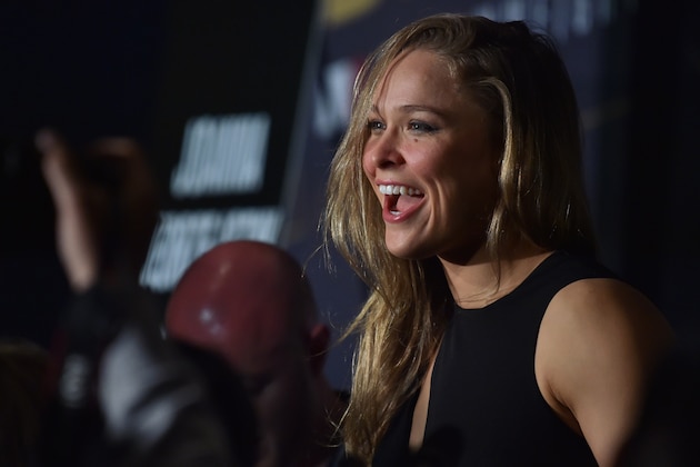 Ronda Rousey of the US talks to the press before a face-off for the UFC fight in Melbourne on November 13, 2015.  Over 55,000 are expected to attend the UFC fight between Rousey and compatriot Holly Holm in Melbourne on November 15.   RESTRICTED TO EDITORIAL USE NO ADVERTISING USE NO PROMOTIONAL USE NO MERCHANDISING USE   AFP PHOTO/Paul CROCK        (Photo credit should read PAUL CROCK/AFP/Getty Images)