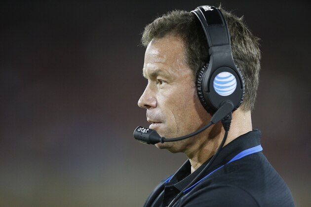 UCLA coach Jim Mora watches from the sideline during the second half against Stanford in an NCAA college football game Thursday, Oct. 15, 2015, Stanford, Calif. Stanford won 56-35. (AP Photo/Tony Avelar)