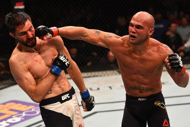 LAS VEGAS, NV - JANUARY 02: (R-L) Robbie Lawler punches Carlos Condit in their UFC welterweight championship bout during the UFC 195 event inside MGM Grand Garden Arena on January 2, 2016 in Las Vegas, Nevada.  (Photo by Josh Hedges/Zuffa LLC/Zuffa LLC via Getty Images)