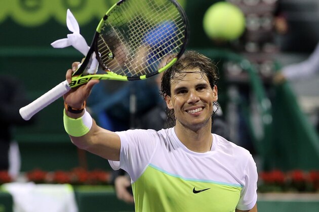 Spanish player Rafael Nadal celebrates after winning against his compatriot Pablo Carreno Busta in their tennis match during the Qatar Open tournament on January 5, 2016, in Doha. AFP PHOTO / KARIM JAAFAR / AFP / KARIM JAAFAR (Photo credit should read KARIM JAAFAR/AFP/Getty Images) Spanish player Rafael Nadal celebrates after winning against his compatriot Pablo Carreno Busta in their tennis match during the Qatar Open tournament on January 5, 2016, in Doha. AFP PHOTO / KARIM JAAFAR / AFP / KARIM JAAFAR (Photo credit should read KARIM JAAFAR/AFP/Getty Images)