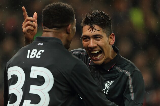 STOKE ON TRENT, ENGLAND - JANUARY 05: Jordon Ibe of Liverpool celebrates with team-mate Roberto Firmino after scoring a goal to make it 0-1 during the Capital One Cup Semi Final, First Leg, between Stoke City and Liverpool at Britannia Stadium on January 5, 2016 in Stoke on Trent, England.  (Photo by Matthew Ashton - AMA/Getty Images)