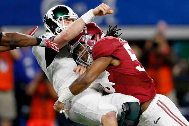ARLINGTON, TX - DECEMBER 31:  Tim Williams #56 of the Alabama Crimson Tide sacks Connor Cook #18 of the Michigan State Spartans in the second half during the Goodyear Cotton Bowl at AT&T Stadium on December 31, 2015 in Arlington, Texas.  (Photo by Ron Jenkins/Getty Images)