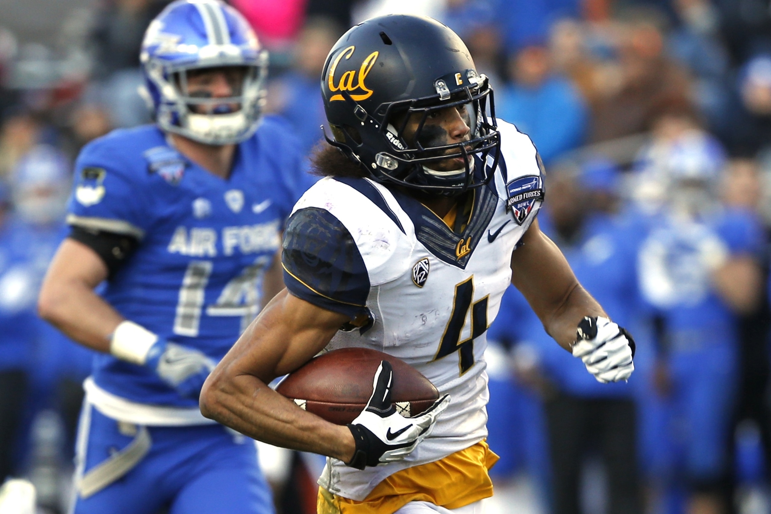 California wide receiver Kenny Lawler (4) takes the ball in for a touchdown against Air Force defensive back Hayes Linn (14) during the second half of the Armed Forces Bowl NCAA college football game, Tuesday, Dec. 29, 2015, in Fort Worth, Texas. California won 55-36. (AP Photo/Ron Jenkins)