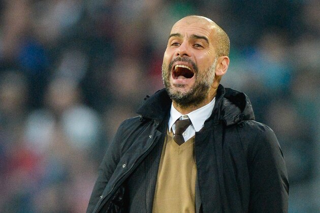 Bayern Munich's Spanish head coach Pep Guardiola attends the German first division Bundesliga football match Hannover 96 vs FC Bayern Munich on December 19, 2015 in Hanover, central Germany.  / AFP / NIGEL TREBLIN / RESTRICTIONS: DURING MATCH TIME: DFL RULES TO LIMIT THE ONLINE USAGE TO 15 PICTURES PER MATCH AND FORBID IMAGE SEQUENCES TO SIMULATE VIDEO. == RESTRICTED TO EDITORIAL USE == FOR FURTHER QUERIES PLEASE CONTACT DFL DIRECTLY AT + 49 69 650050
        (Photo credit should read NIGEL TREBLIN/AFP/Getty Images)