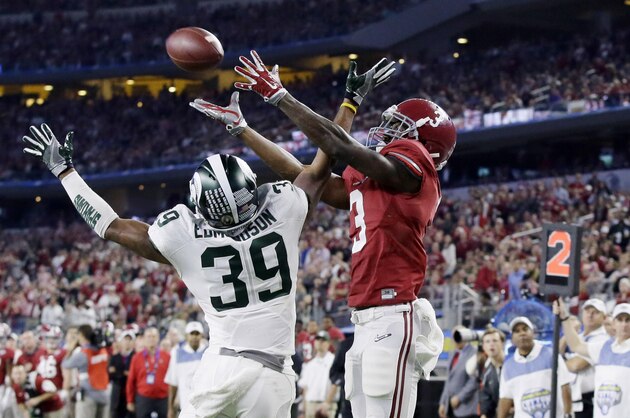 Alabama wide receiver Calvin Ridley (3) makes a touchdown reception over Michigan State cornerback Jermaine Edmondson (39) during the second half of the Cotton Bowl NCAA college football semifinal playoff game, Thursday, Dec. 31, 2015, in Arlington, Texas. (AP Photo/LM Otero)