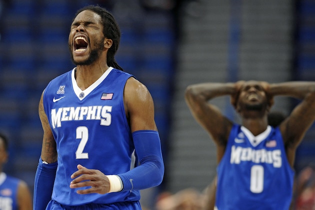 Memphis’ Shaq Goodwin, left, and Trahson Burrell, right, react after a foul called against Memphis during the second half of an NCAA college basketball game against Temple in the quarterfinal round of the American Athletic Conference tournament, Friday, March 13, 2015, in Hartford, Conn.  Temple won 80-75. (AP Photo/Jessica Hill)