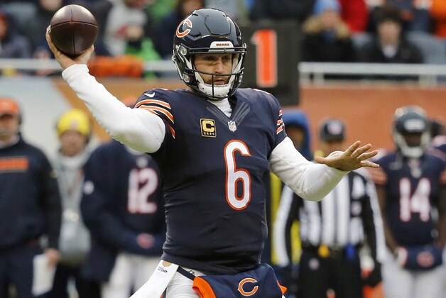 FILE - In this Jan. 3, 2016, file photo, Chicago Bears quarterback Jay Cutler throws a pass against the Detroit Lions in an NFL football game in Chicago. The Bears have a big job ahead of them after a last-place finish in the NFC North at 6-10. With or without offensive coordinator Adam Gase, general manager Ryan Pace said the Bears have “extreme confidence” in Cutler and plan to build the offense around him. (AP Photo/Charles Rex Arbogast, File)