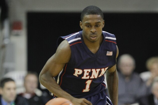 Penn's Tony Hicks (1) in action during an NCAA college basketball game with Villanova, Wednesday, Dec. 4, 2013, in Villanova. (AP Photo/Laurence Kesterson)