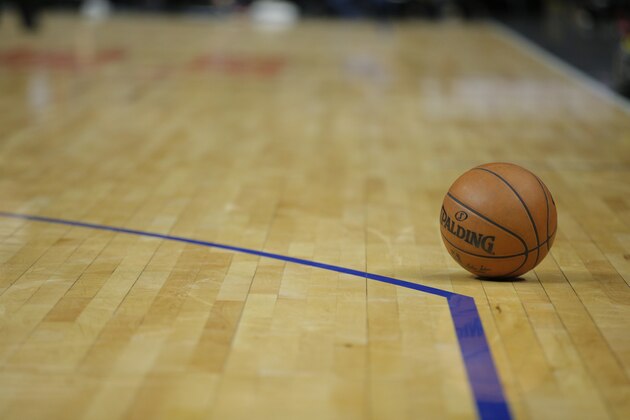 A ball sits on the floor during the second half of an NBA basketball game between the Los Angeles Clippers and the Oklahoma City Thunder, Monday, Dec. 21, 2015, in Los Angeles. (AP Photo/Jae C. Hong)