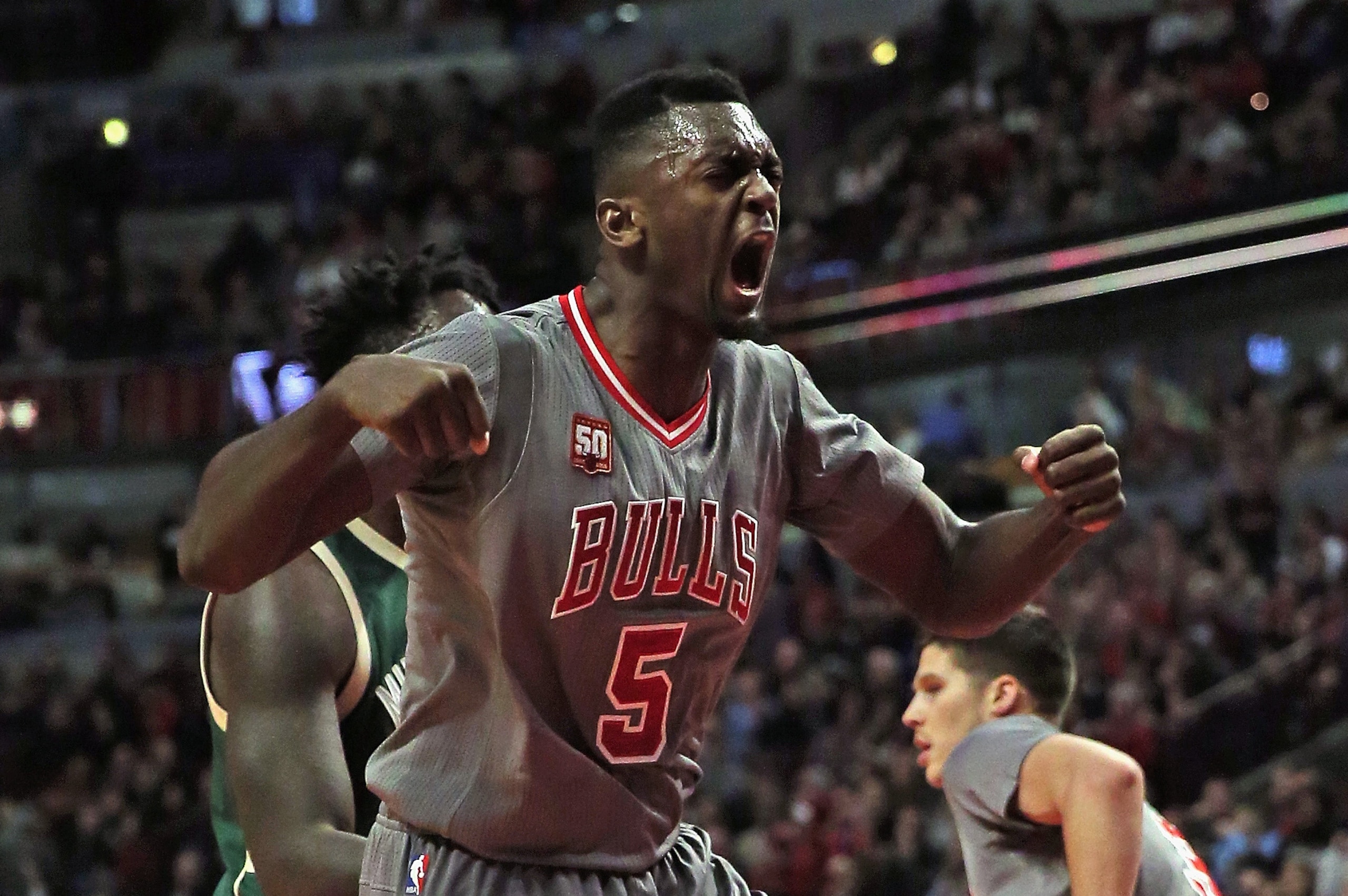 CHICAGO, IL - JANUARY 05: Bobby Portis #5 of the Chicago Bulls celebrates hitting a second chance shot against the Milwaukee Bucks at the United Center on January 5, 2016 in Chicago, Illinois. The Bulls defeated the Bucks 117-106. NOTE TO USER: User expressly acknowledges and agrees that, by downloading and or using the photograph, User is consenting to the terms and conditions of the Getty Images License Agreement. (Photo by Jonathan Daniel/Getty Images)