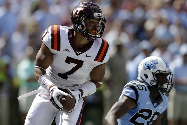 Virginia Tech's Bucky Hodges (7) celebrates his touchdown against North Carolina during the first half of an NCAA college football game in Chapel Hill, N.C., Saturday, Oct. 4, 2014. Virginia Tech won 34-17. (AP Photo/Gerry Broome)