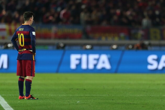 YOKOHAMA, JAPAN - DECEMBER 20:  Lionel Messi of FC Barcelona with FIFA branding during the FIFA Club World Cup Final Match between FC Barcelona and River Plate at International Stadium Yokohama on December 20, 2015 in Yokohama, Japan.  (Photo by Matthew Ashton - AMA/Getty Images)