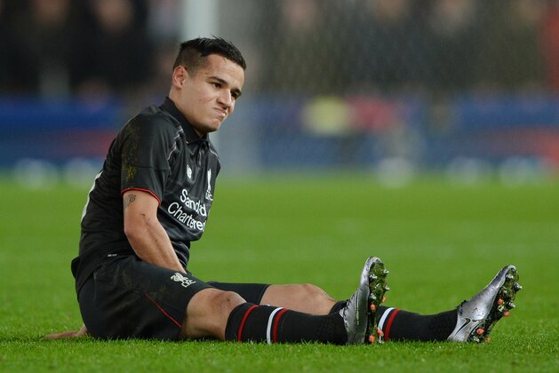 STOKE ON TRENT, ENGLAND - JANUARY 05:  Philippe Coutinho of Liverpool reacts after going down with an injury during the Capital One Cup semi final, first leg match between Stoke City and Liverpool at the Britannia Stadium on January 5, 2016 in Stoke on Trent, England.  (Photo by Gareth Copley/Getty Images)