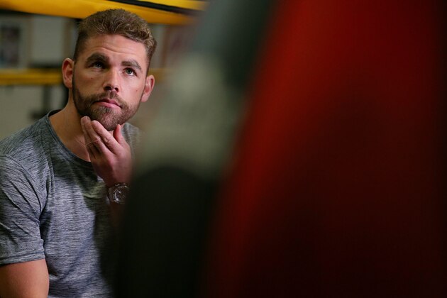 SALFORD, ENGLAND - DECEMBER 14: Boxer Billy Joe Saunders gives a television interview during a media work-out at Oliver's Gym on December 14, 2015 in Salford, England. Saunders faces champion Andy Lee for the World Middleweight Title this Saturday in Manchester. (Photo by Dave Thompson/Getty Images)