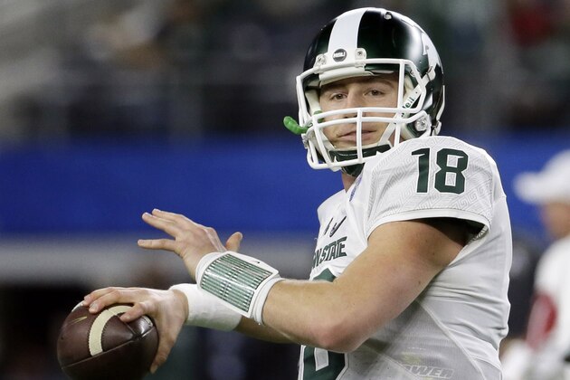 Michigan State quarterback Connor Cook warms up before the Cotton Bowl NCAA college football semifinal playoff game against Alabama, Thursday, Dec. 31, 2015, in Arlington, Texas. (AP Photo/Tony Gutierrez)