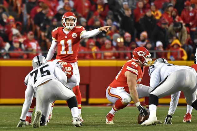 KANSAS CITY, MO - JANUARY 03:  Quarterback Alex Smith #11 of the Kansas City Chiefs calls out an audible against the Oakland Raiders during the first half on January 3, 2016 at Arrowhead Stadium in Kansas City, Missouri.  (Photo by Peter G. Aiken/Getty Images)