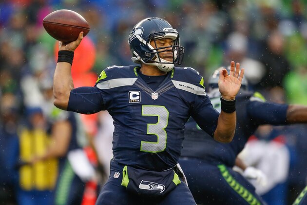SEATTLE, WA - DECEMBER 27:  Quarterback Russell Wilson #3 of the Seattle Seahawks passes against the St. Louis Rams at CenturyLink Field on December 27, 2015 in Seattle, Washington. The Rams defeated the Seahawks 23-17.  (Photo by Otto Greule Jr/Getty Images)