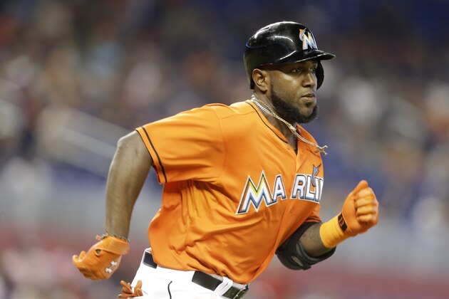 Miami Marlins' Marcell Ozuna runs the bases during a baseball game against the Washington Nationals, Sunday, Sept. 13, 2015, in Miami. The Nationals defeated the Marlins 5-0. (AP Photo/Lynne Sladky)