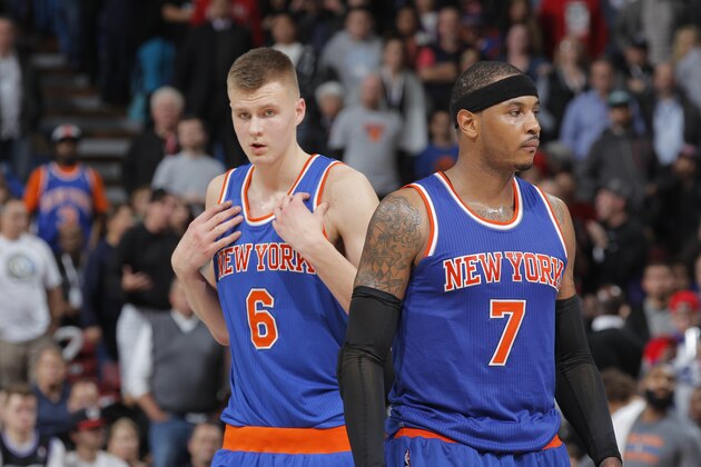 SACRAMENTO, CA - DECEMBER 10: Kristaps Porzingis #6 and Carmelo Anthony #7 of the New York Knicks look on during the game against the Sacramento Kings on December 10, 2015 at Sleep Train Arena in Sacramento, California. NOTE TO USER: User expressly acknowledges and agrees that, by downloading and or using this photograph, User is consenting to the terms and conditions of the Getty Images Agreement. Mandatory Copyright Notice: Copyright 2015 NBAE (Photo by Rocky Widner/NBAE via Getty Images)