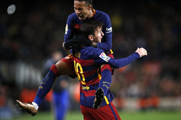 FC Barcelona's Lionel Messi, celebrates after scoring against Espanyol with teammate Neymar  during a Copa del Rey soccer match at the Camp Nou stadium in Barcelona, Spain, Wednesday, Jan. 6, 2016. (AP Photo/Manu Fernandez)