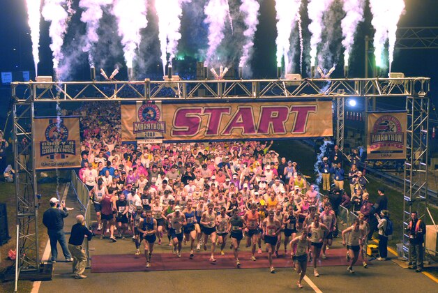 Nearly 22,000 participants head out at the start of the Walt Disney World Marathon in Lake Buena Vista, Fla., Sunday, Jan. 11, 2009. This year's race marked the 16th year of the event. (AP Photo/Phelan M. Ebenhack)