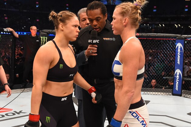 MELBOURNE, AUSTRALIA - NOVEMBER 15:  (L-R) Opponents UFC women's bantamweight champion Ronda Rousey of the United States and Holly Holm of the United States face off before their UFC women's bantamweight championship bout during the UFC 193 event at Etihad Stadium on November 15, 2015 in Melbourne, Australia. (Photo by Josh Hedges/Zuffa LLC/Zuffa LLC via Getty Images)