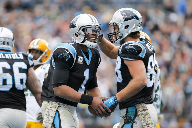 Carolina Panthers quarterback Cam Newton (1) and tight end Greg Olsen (88) celebrate a touchdown against the Green Bay Packers during an NFL game at Bank of America Stadium in Charlotte, N.C. on Sunday, Nov. 8, 2015. (Chris Keane/AP Images for Panini)