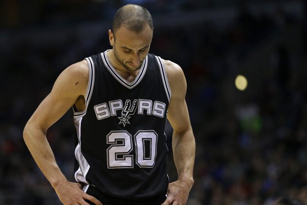 San Antonio Spurs' Manu Ginobili looks down during an NBA basketball game against the Milwaukee Bucks Monday, Jan. 4, 2016, in Milwaukee. (AP Photo/Aaron Gash)
