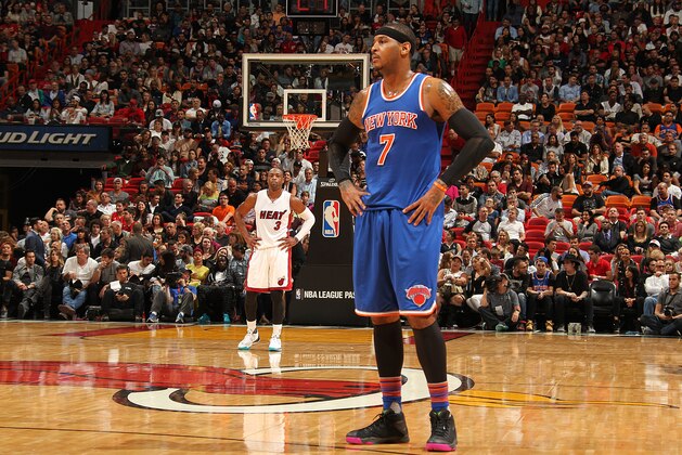 MIAMI, FL - JANUARY 6:  Dwyane Wade #3 of the Miami Heat and Carmelo Anthony #7 of the New York Knicks stand on the court during the game on January 6, 2016 at American Airlines Arena in Miami, Florida. NOTE TO USER: User expressly acknowledges and agrees that, by downloading and or using this Photograph, user is consenting to the terms and conditions of the Getty Images License Agreement. Mandatory Copyright Notice: Copyright 2016 NBAE (Photo by Issac Baldizon/NBAE via Getty Images)