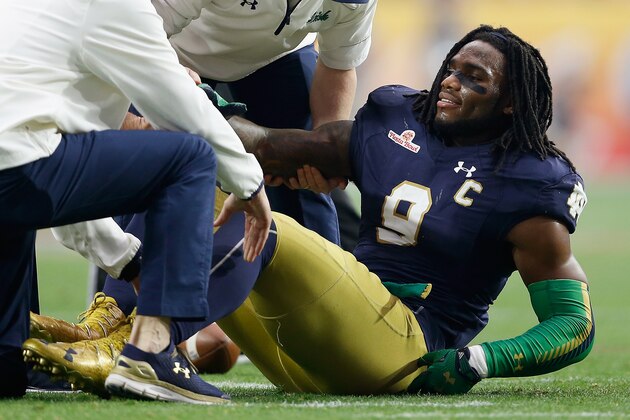 GLENDALE, AZ - JANUARY 01:  Linebacker Jaylon Smith #9 of the Notre Dame Fighting Irish lays on the field after an injury during the first quarter of the BattleFrog Fiesta Bowl against the Ohio State Buckeyes at University of Phoenix Stadium on January 1, 2016 in Glendale, Arizona.  The Buckeyes defeated the Fighting Irish 44-28.  (Photo by Christian Petersen/Getty Images)