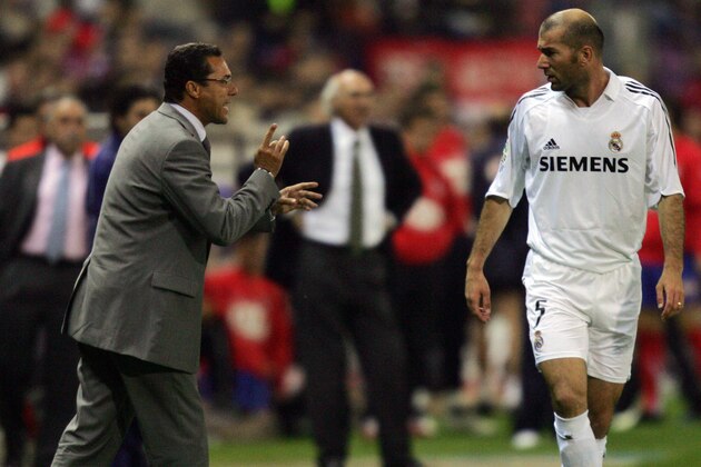 MADRID, Spain:  Real Madrid's Brazilian coach Vanderlei Luxemburgo (L) gives instructions to his French midfielder Zinedine Zidane during their Spanish league football match against Atletico de Madrid at the Vicente Calderon stadium in Madrid, 15 October 2005.  AFP PHOTO JAVIER SORIANO  (Photo credit should read JAVIER SORIANO/AFP/Getty Images)