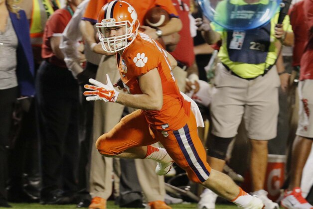 Clemson wide receiver Hunter Renfrow (13) runs for a touchdown during the second half of the Orange Bowl NCAA college football semifinal playoff game against Oklahoma, Thursday, Dec. 31, 2015, in Miami Gardens, Fla.  (AP Photo/Joe Skipper)