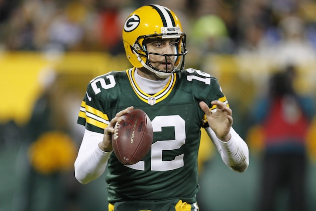 Green Bay Packers' Aaron Rodgers drops back during the first half an NFL football game against the Minnesota Vikings Sunday, Jan. 3, 2016, in Green Bay, Wis. (AP Photo/Matt Ludtke)