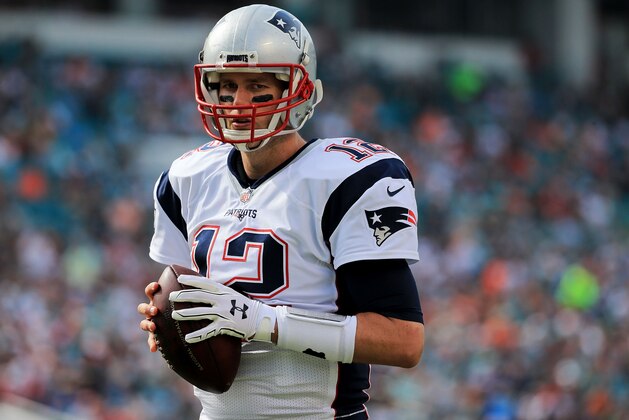 MIAMI GARDENS, FL - JANUARy 03: Tom Brady #12 of the New England Patriots looks on during the game against the Miami Dolphins at Sun Life Stadium on January 3, 2016 in Miami Gardens, Florida. (Photo by Mike Ehrmann/Getty Images)