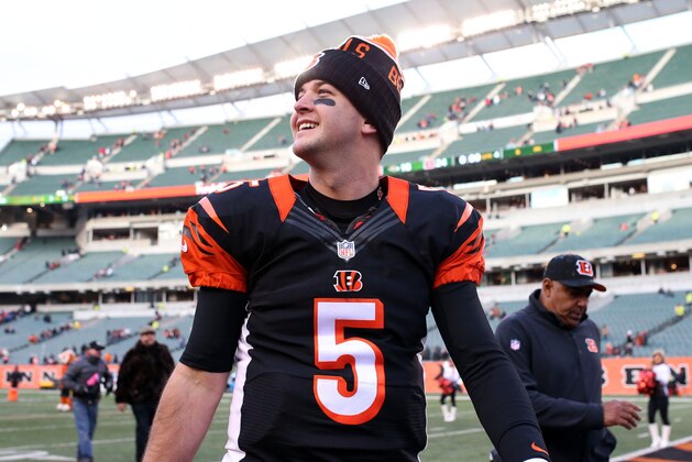 Jan 3, 2016; Cincinnati, OH, USA; Cincinnati Bengals quarterback AJ McCarron (5) looks on after the game against the Baltimore Ravens at Paul Brown Stadium. The bengals won 24-16. Mandatory Credit: Aaron Doster-USA TODAY Sports