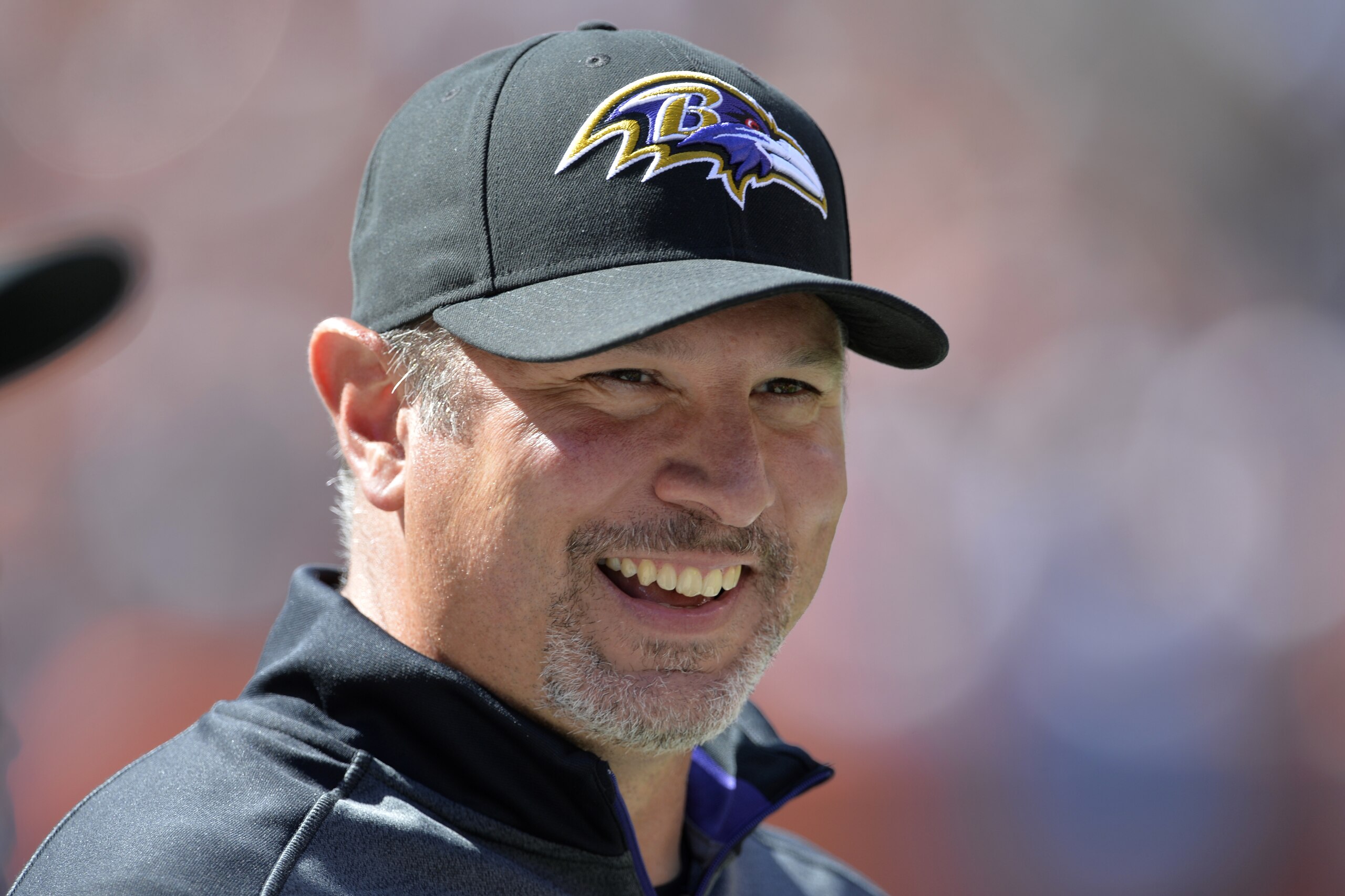 Baltimore Ravens linebackers coach Ted Monachino stands on the sideline prior to an NFL football game against the Cleveland Browns Sunday, Sept. 21, 2014, in Cleveland. Baltimore won 23-21. (AP Photo/David Richard)