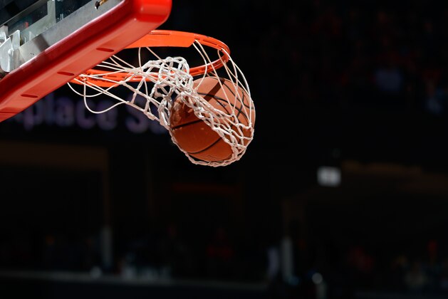COLLEGE PARK, MD - DECEMBER 30: A basketball goes through the hoop during the game between the Maryland Terrapins and the Penn State Nittany Lions at the Xfinity Center on December 30, 2015 in College Park, Maryland.  (Photo by G Fiume/Maryland Terrapins/Getty Images)