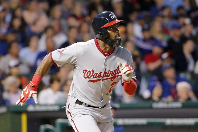 Washington Nationals' Denard Span (2) watches his home run off Chicago Cubs relief pitcher Pedro Strop during the eighth inning of a baseball game Tuesday, May 26, 2015, in Chicago. (AP Photo/Charles Rex Arbogast)