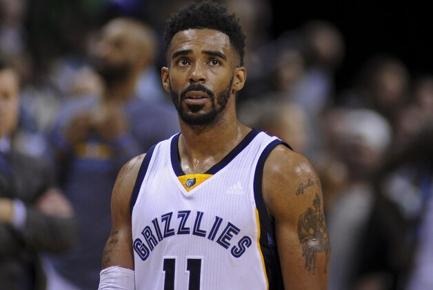 Dec 19, 2015; Memphis, TN, USA; Memphis Grizzlies guard Mike Conley (11) reacts against the Indiana Pacers during the second half at FedExForum. Memphis beat Indiana 96-84. Mandatory Credit: Justin Ford-USA TODAY Sports