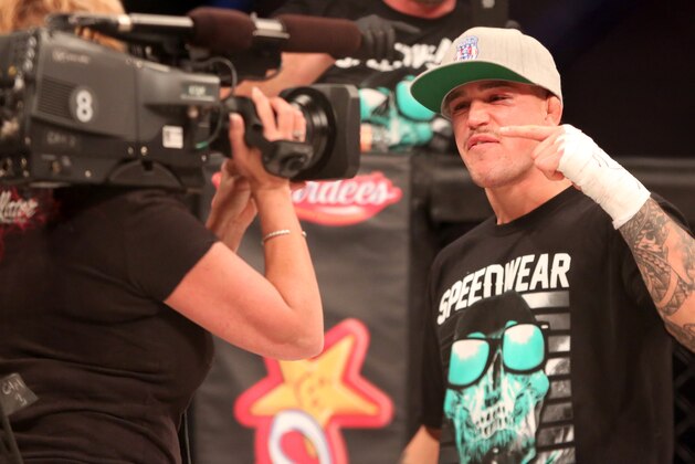 Brennan Ward  celebrates his win against Curtis Millender at Bellator 134 on Friday, Feb. 27, 2015, in Uncasville, CT.  Ward won the fight via rear naked choke submission. (AP Photo/Gregory Payan)