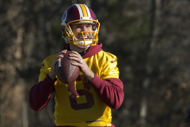 Washington Redskins quarterback Kirk Cousins, eyes the receiver during NFL football practice at Redskins Park in Ashburn, Va., Wednesday, Jan. 6, 2016.  (AP Photo/Manuel Balce Ceneta)