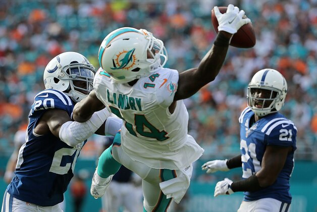 MIAMI GARDENS, FL - DECEMBER 27:  Jarvis Landry #14 of the Miami Dolphins makes a one handed catch during a game against the Indianapolis Colts at Sun Life Stadium on December 27, 2015 in Miami Gardens, Florida.  (Photo by Mike Ehrmann/Getty Images)