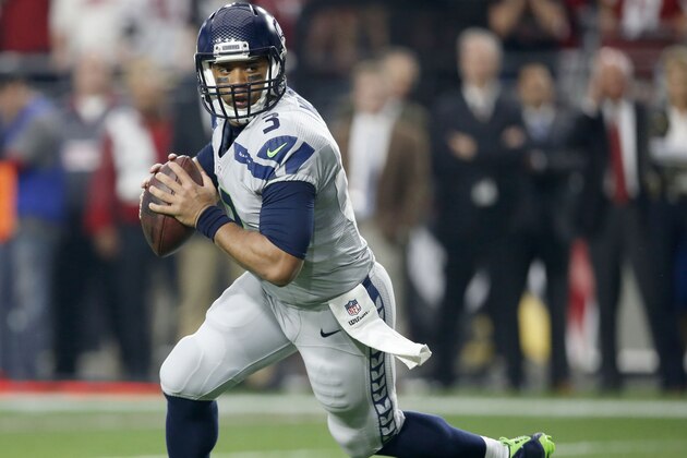 Seattle Seahawks quarterback Russell Wilson (3) scrambles against the Arizona Cardinals during the first half of an NFL football game, Sunday, Jan. 3, 2016, in Glendale, Ariz. (AP Photo/Ross D. Franklin)