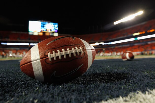 MIAMI GARDENS, FL - JANUARY 04:  A detail of a Nike official NCAA size football as it sits in the end zone while the West Virginia Mountaineers stretchon the field prior to playing against the Clemson Tigers during the Discover Orange Bowl at Sun Life Stadium on January 4, 2012 in Miami Gardens, Florida.  (Photo by Streeter Lecka/Getty Images)